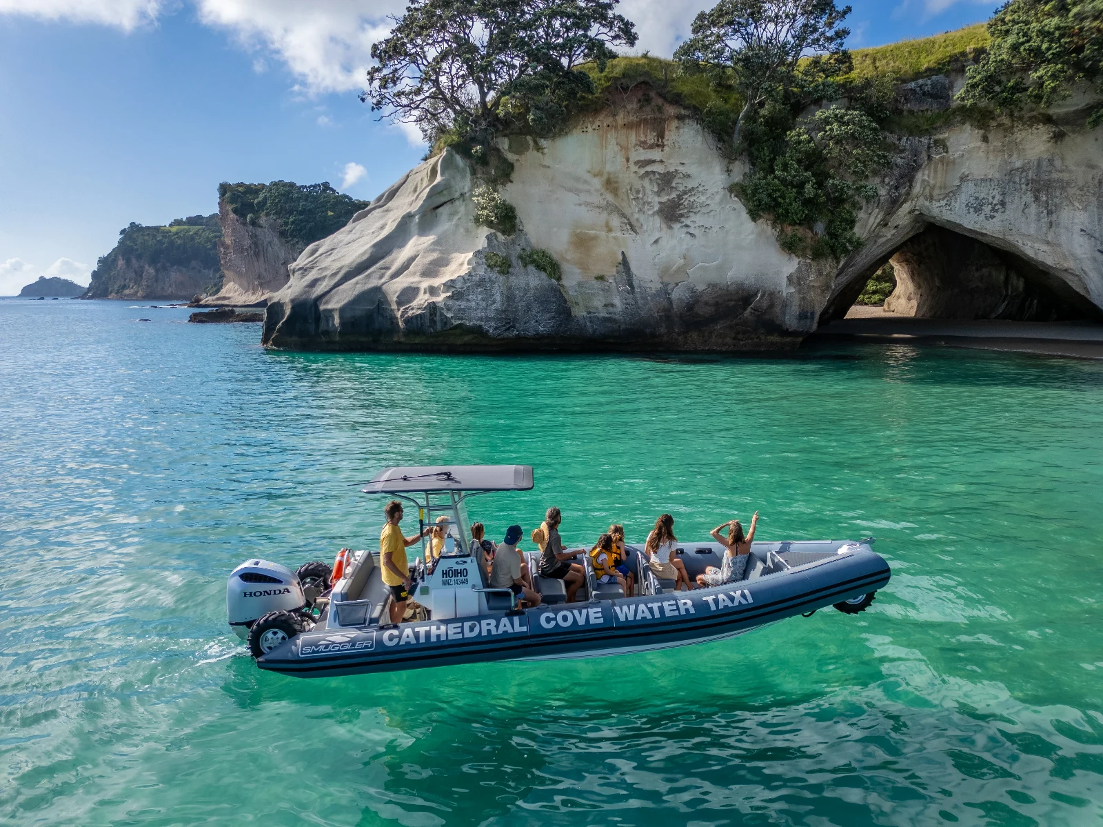Passengers enjoying the short boat trip to Cathedral Cove